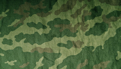 Old camouflage cloth pattern. © pavelalexeev