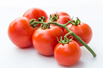 Close up red cherry tomato on white background isolated.
