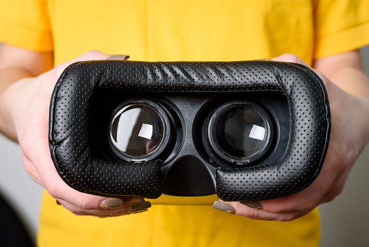 Virtual reality concept. Man or women holding VR glasses in Hand