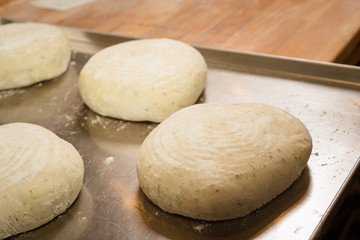 Making dough on tray