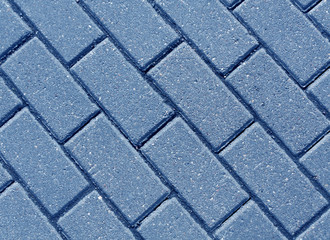 Blue color cobblestone pavement close-up
