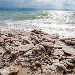 Fototapeta premium natural salt on shore of Dead Sea in winter