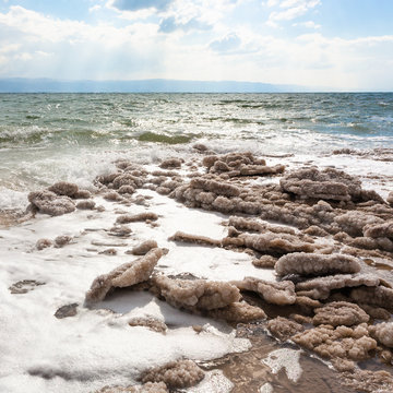natural salt on coast of Dead Sea in winter