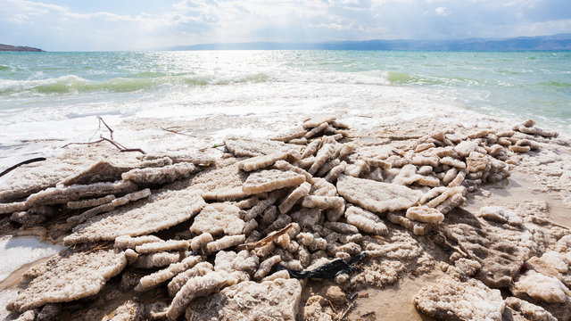 natural salt on coastline of Dead Sea in winter