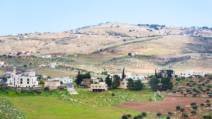 village and terraced gardens in Jordan in winter