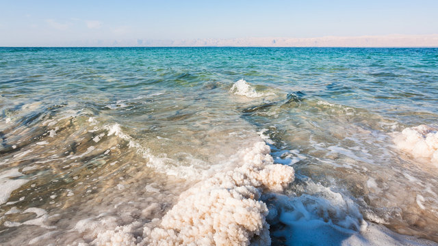 salt crystals close up on shore of Dead Sea