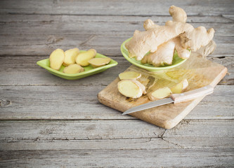 Ginger on wooden background