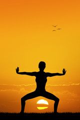 yoga pose at sunset
