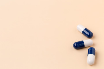 Various colorful pills on color background