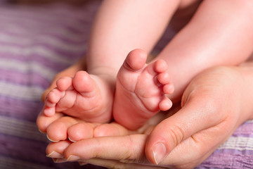 Obraz na płótnie Canvas little infant foot
