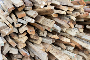 the pile of timber waing for build anything in the site of construction