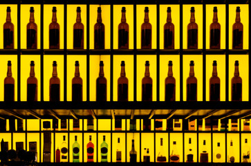 Various alcohol bottles in a bar