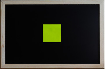 blank sticky note or post note colorful on blackboard.