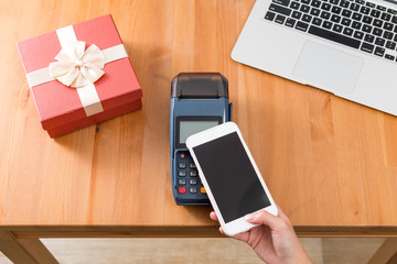 Pay with cellphone on POS machine for buying gift