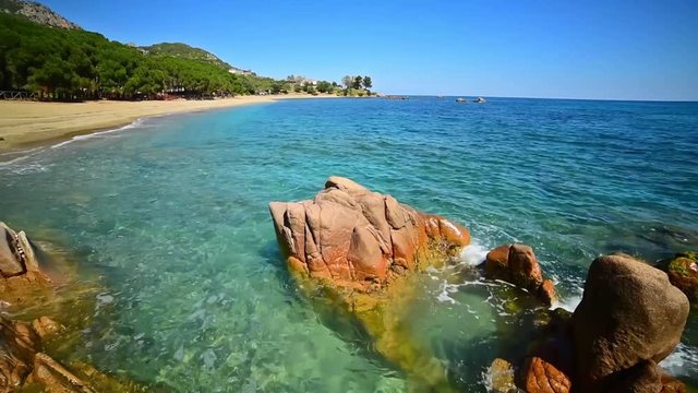 rocks and blue sea in Santa Maria Navarrese beach, Sardinia