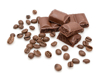 Chocolate slices and coffee beans on a white background. Photo for your catalog or store.