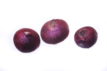 Red onion isolated on white background.