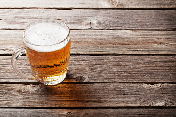 Beer mug on wooden table