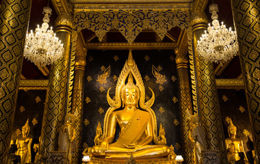 Statue of golden bhudda in public temple, Thailand