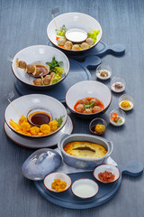 Still life of meat balls and sauces on the dining table