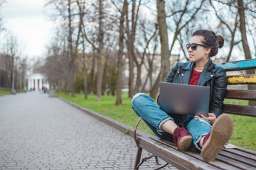 Fototapeta premium young gilr working in park