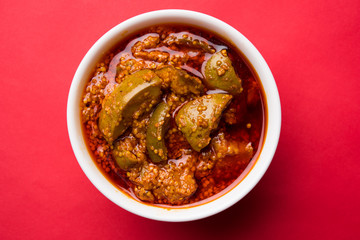 Homemade Mango Pickle or aam ka achar or achaar in white bowl, selective focus © StockImageFactory
