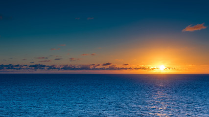 Obraz na płótnie Canvas Sunset Over the Ocean