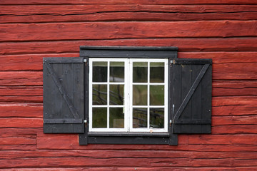 Window on red house