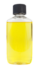 Clear plastic bottle with black cap containing yellow liquid. Isolated. Vertical.