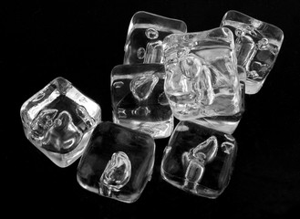 Ice cubes on a black background.