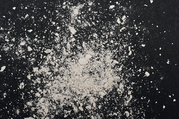 Face Powder scattered on dark Background
