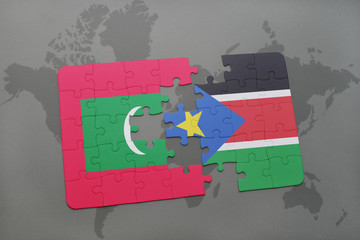 puzzle with the national flag of maldives and south sudan on a world map