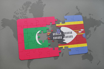 puzzle with the national flag of maldives and swaziland on a world map
