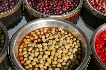 stall with Mediterranean olives and other products for sale