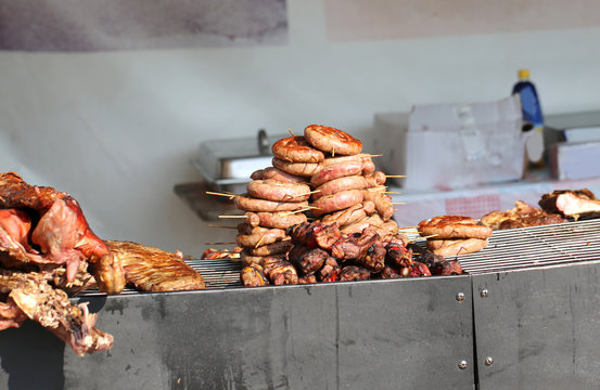 street food stall with big grilled sausages