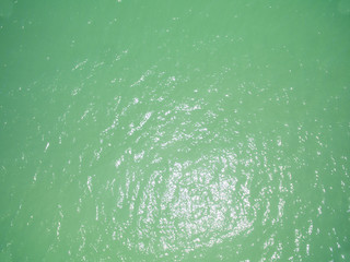 Green sea at a brazilian beach top view. © paulovilela