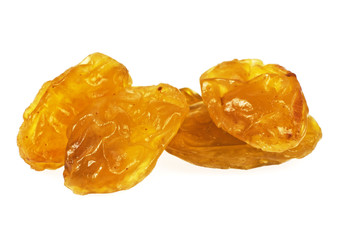 Sweet yellow raisins isolated on a white background, closeup