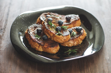 Sweet croutons with blueberries and rosemary