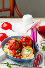 Turkey  meat balls stuffed with feta cheese in tomato sauce