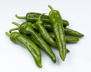 Green sweet peppers isolated on white background