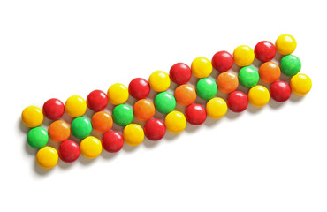 Delicious candies on white background