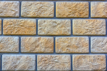 Beige brick wall background texture