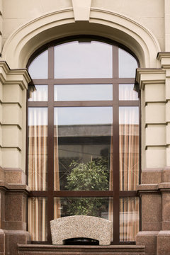Arched window with redeveloped wall background