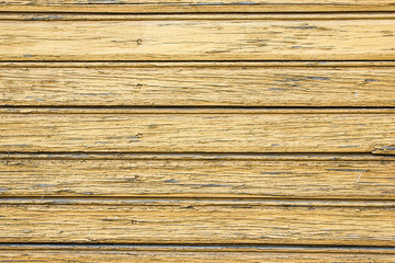 Fototapeta premium Aged wooden wall with peeling paint texture. 