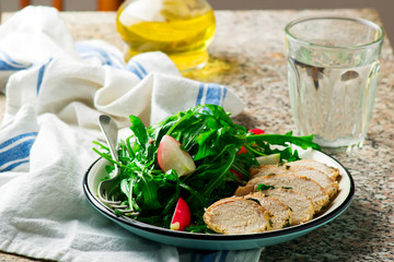 Chicken with Lemon and Wine over Arugula