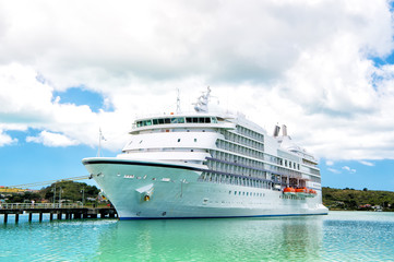 big cruise ship, white luxury yacht in sea port, Antigua