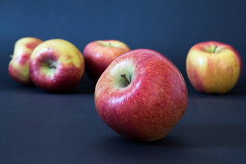 Fresh apples isolated on black background