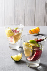 Summer soft drink with orange and lime