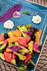 Decorated plate with vegetable salad