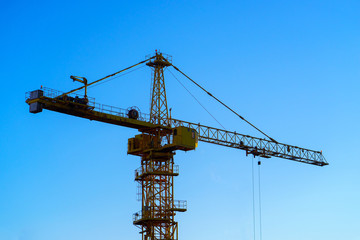 construction crane on the blue sky background
